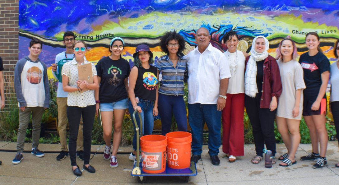 image of Dr. Cabrera-Trimiño with Heritage Garden interns and LCC Director